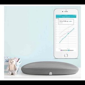 Hatch baby grow smart changing pad and scale